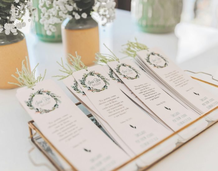 Beautifully arranged wedding ceremony programs with floral decor in Portugal.
